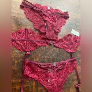 La Senza set of two red lace panties and garter belt NWT